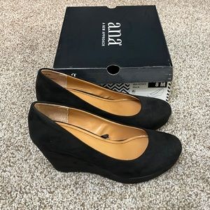 Black suede wedge heels